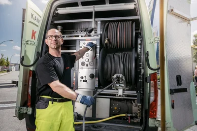 Flachdach entkiesen in München mit Saugbagger